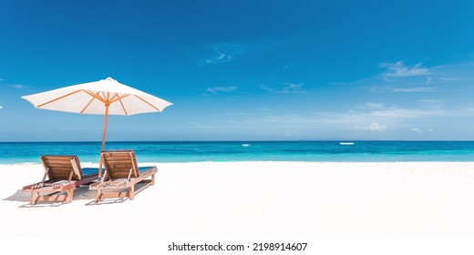 Couple Relaxing in Deck Chairs on Tropical Beach - Shutterstock ID 2198914607