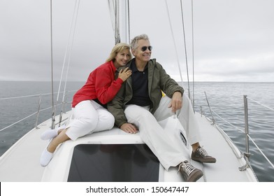 Couple relaxing on yacht