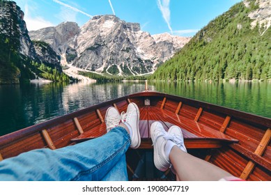 couple resting on boat at mountain lake. summer vacation - Shutterstock ID 1908047719