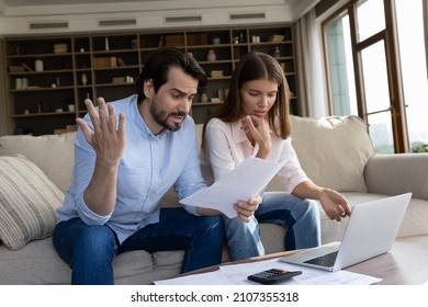 Couple reviewing bills feels stressed having financial problem, check finances, experiencing lack of money pay for loan, huge taxes, utility rates, get eviction notice, bank debt notification concept