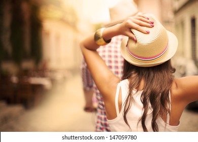 Couple riding a bicycle in the city  - Powered by Shutterstock