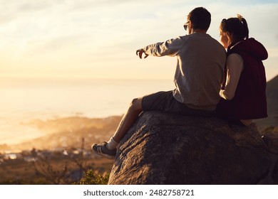 Couple, rock and outdoor with relax on cliff or point for view, adventure and bonding in nature or environment. Man, woman and together on mountain for fresh air, peace and horizon with love on trip. - Powered by Shutterstock