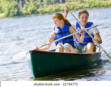 Couple Rowing Boat