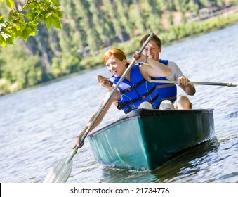 Couple Rowing Boat