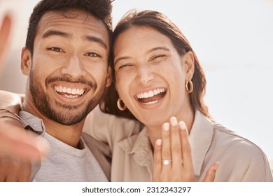 Couple in selfie, proposal and engagement ring with love and commitment, happy in portrait with social media post. Face, man and woman with marriage, happiness and care, smile in picture with jewelry - Powered by Shutterstock