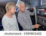 a couple setting up machine