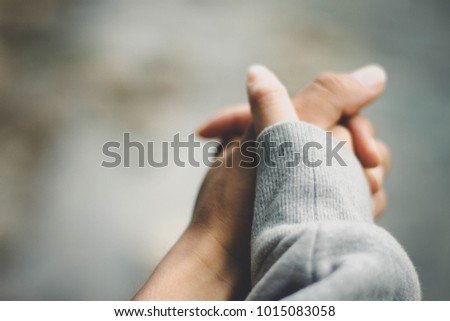 
Couple are shaking hands in the park. And show love to each other.