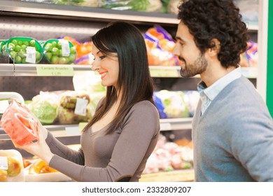     Couple shopping in a supermarket - Powered by Shutterstock