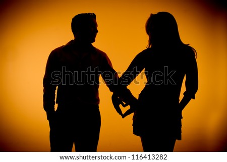 couple silouette photography holding hands