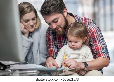 Couple sitting at desk