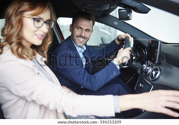 Couple sitting in
the front passengers seats
