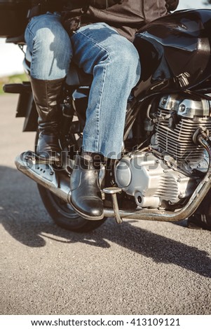 Image, Stock Photo Couple sitting over motorcycle ready to go