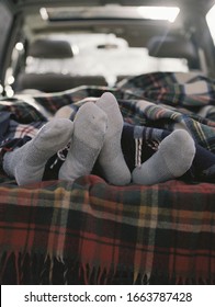 Couple Sleeping In The Back Of Their Car.