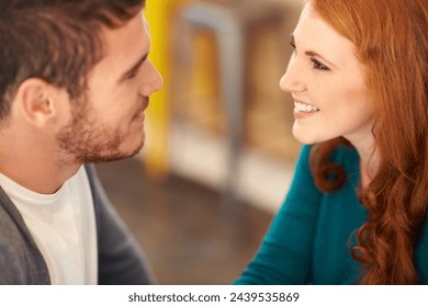 Couple, smile and romance with eye contact in cafe, support and happiness for peace in relationship. Adult, woman and girl with love for man or partner in coffee shop and joy for marriage with guy - Powered by Shutterstock