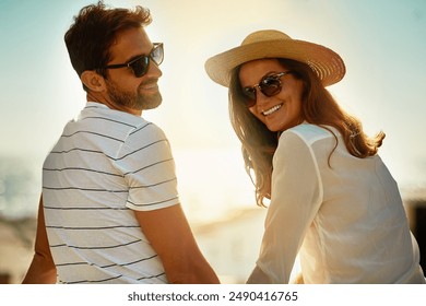 Couple smile, sunglasses and relax for outdoor date, bonding together and summer vacation trip. Happy man, woman and shades for outside sunshine with love, marriage and travel for honeymoon holiday - Powered by Shutterstock