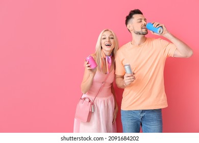 Couple with soda on color background - Powered by Shutterstock