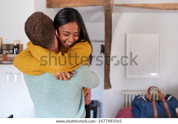 Couple Spending Romantic Weekend Away Hugging Stock Image