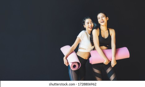 Couple sporty asian woman standing and talking with happiness motion, wearing sportswear bra and pants fashion, posture position, sport club community, sports and healthcare concept - Powered by Shutterstock