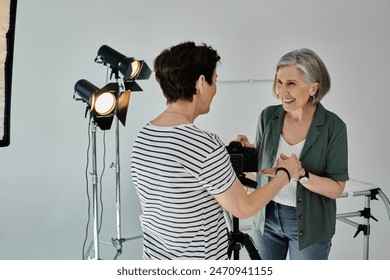 couple stand together, ready for a photo shoot in a modern studio setting. - Powered by Shutterstock