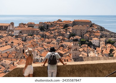 Couple Standing on Top of Dubrovnik City Walls, Croatia - Powered by Shutterstock