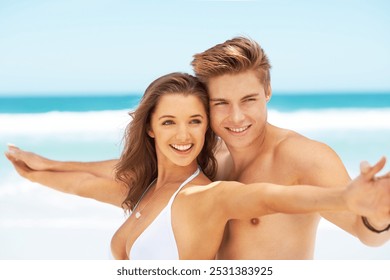 Couple, stretching arms and travel to beach, swimwear and nature for romance in relationship. People, tropical vacation and love for support in marriage, holding hands and holiday trip to Miami - Powered by Shutterstock