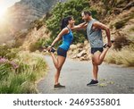 Couple, stretching and together on mountain for fitness, warmup and commitment to wellness. Man, woman and training in nature for health, wellbeing and fresh air for work out, cardio or endurance