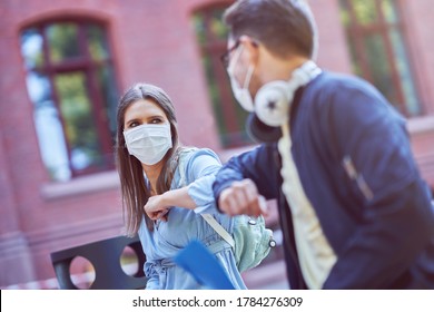 Couple Of Students In The Campus Wearing Masks Due To Coronavirus Pandemic