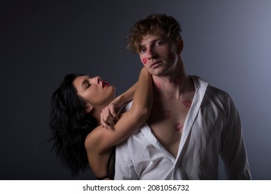 Couple Studio. Couple In Love. Man And Woman Posing Studio. Sensual. Dark. 