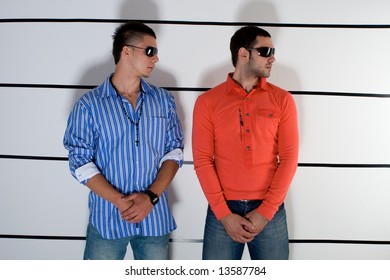 A Couple Of Suspicious Delinquents In Police Station In Line Up