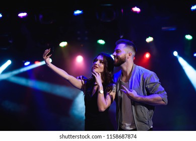 Couple Take A Selfie With A Mobile In The Night Celebration