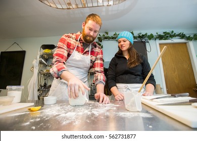 A Couple Takes A Cooking Class With A Chef