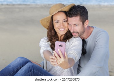 Couple Taking A Selfie On A Winter Break