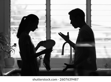 Couple talking in the kitchen, relationship problem solving 