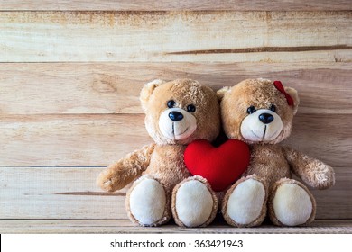 Couple Teddy Bear With Pink Heart-shaped Pillow On Plank Wood Board, Valentine Concept