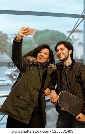Couple of teenagers takes a selfie