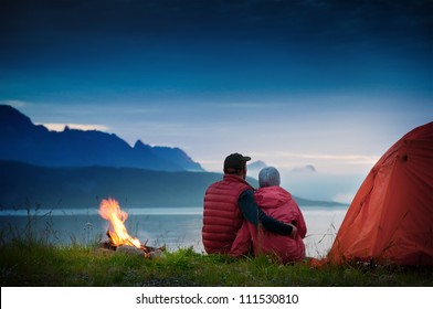 couple with tent near seaside - Powered by Shutterstock