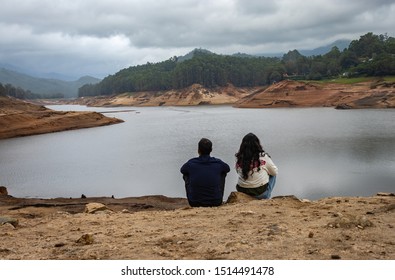 Couple Thinking And Feeling The True Nature At Lakeside Image Is Taken At Munnar Kerala India.