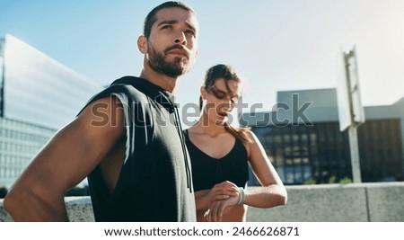 Couple, thinking and training time for performance in city, exercise or workout for race competition. Healthy man and woman with rest in urban town, watch and cardio fitness for outdoors running