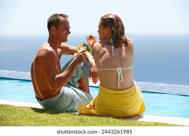 Couple, toast and cocktail by swimming pool with smile, care and vacation with love in summer. Man, woman and happy together with drink, alcohol or outdoor in sunshine, water and holiday in Naples - Powered by Shutterstock