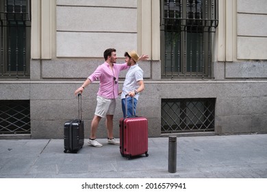 A Couple Of Tourist Happy And Surprised When Then Re-encounter After Long Time. Reunion Of Two Friends.