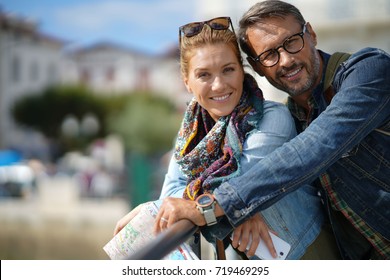 Couple Of Tourists Enjoying Beautiful Day Outside