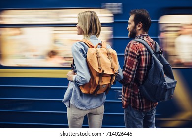 Couple of tourists is exploring new city together. Underground. - Shutterstock ID 714026446