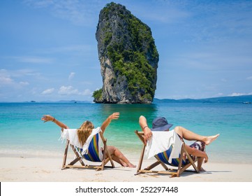 Couple Of Tourists On The Beach In Thailand