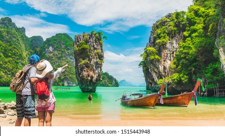 Viajero en pareja en la playa alegría naturaleza paisaje pintoresco James Bond Island, atracción famoso viaje turístico Phuket Tailandia vacaciones al aire libre turismo hermoso lugar turístico Asia