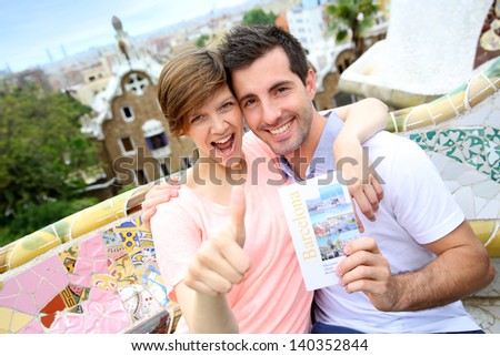Couple of travelers visiting Guell Park