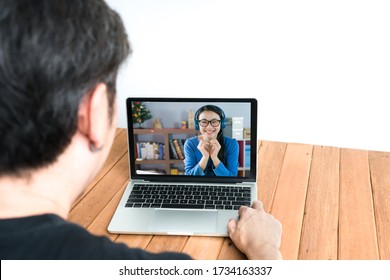 Couple using laptop for video chatting .  Remote communication concept - Shutterstock ID 1734163337