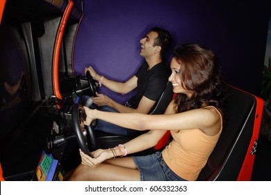 Couple In A Video Game Arcade, Playing Games