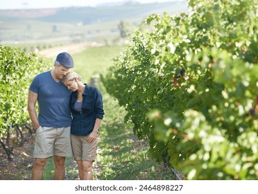 Couple, vineyard and agriculture for business people, wine and farm production in winery. Grapes, hug and relax for calm man and female person or owner, Italy or countryside for eco friendly crops - Powered by Shutterstock