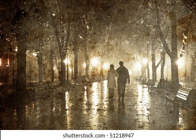 Couple Walking At Alley In Night Lights. Photo In Old Image Style.