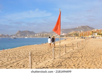 Couple Walking At The Beach In Los Cabos, Mexico